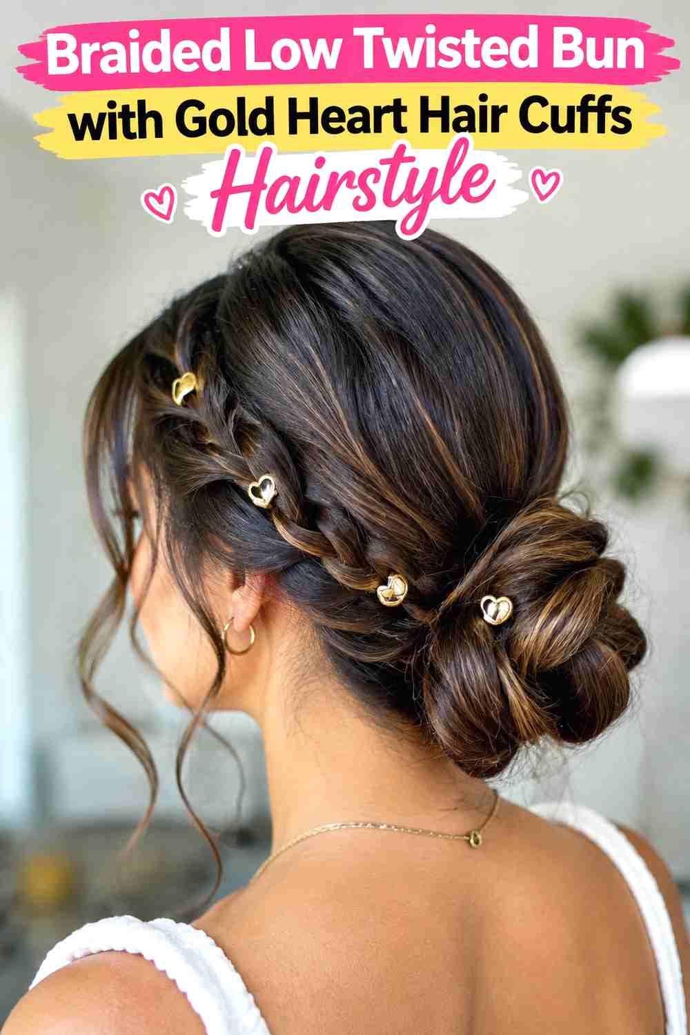 9. Braided Low Twisted Bun With Gold Heart Hair Cuffs Hairstyle