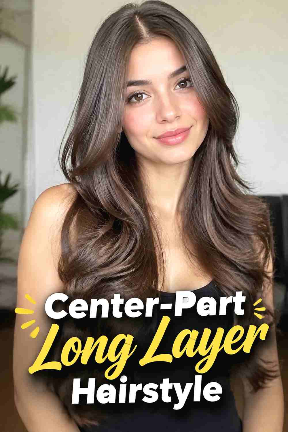 15. Center Part Long Layer Hairstyle