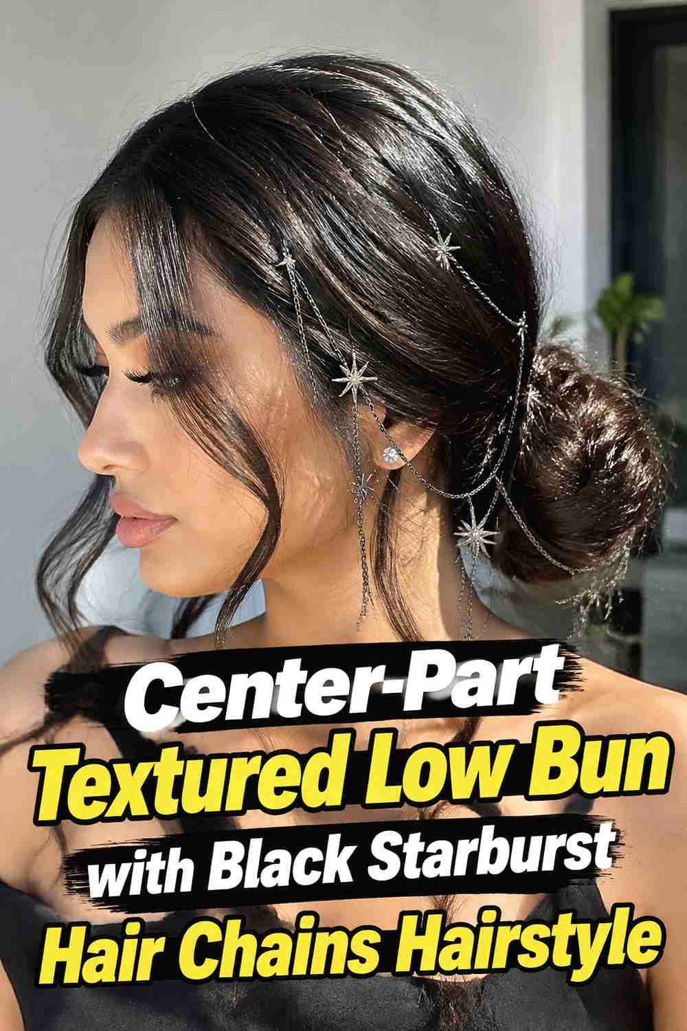 7. Center Part Textured Low Bun With Black Starburst Hair Chains Hairstyle