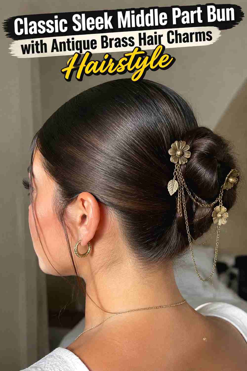 1. Classic Sleek Middle Part Bun With Antique Brass Hair Charms Hairstyle