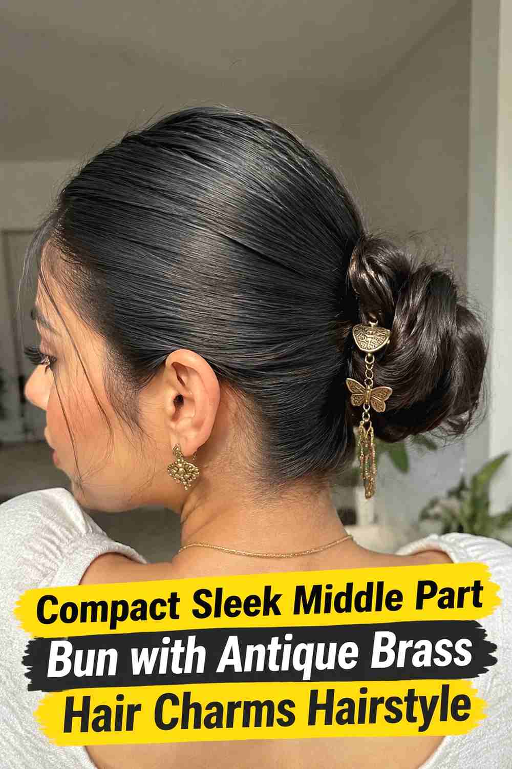 11. Compact Sleek Middle Part Bun With Antique Brass Hair Charms Hairstyle
