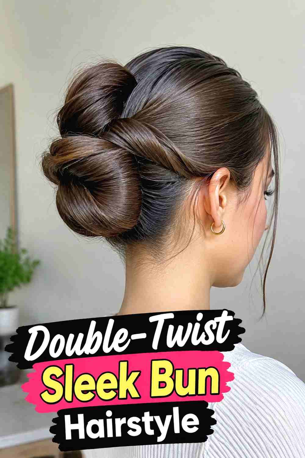 8. Double Twist Sleek Bun Hairstyle