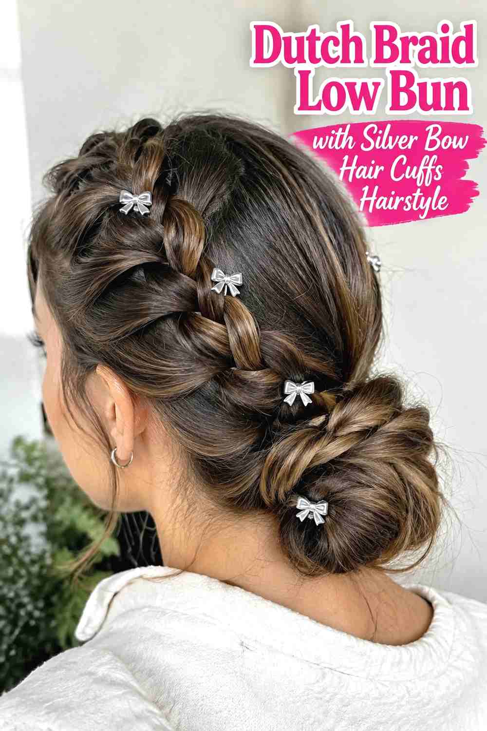 5. Dutch Braid Low Bun With Silver Bow Hair Cuffs Hairstyle