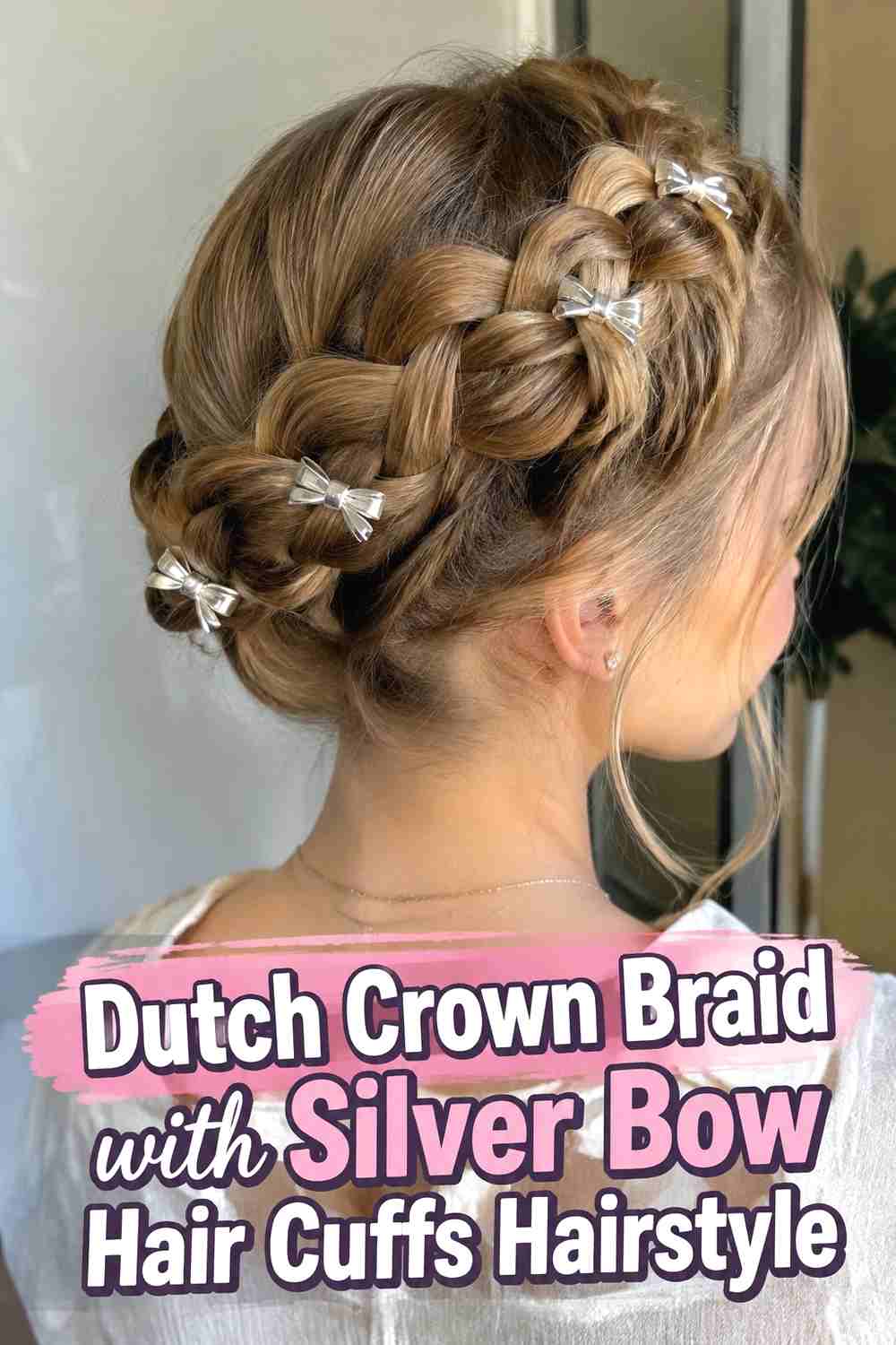 3. Dutch Crown Braid With Silver Bow Hair Cuffs Hairstyle
