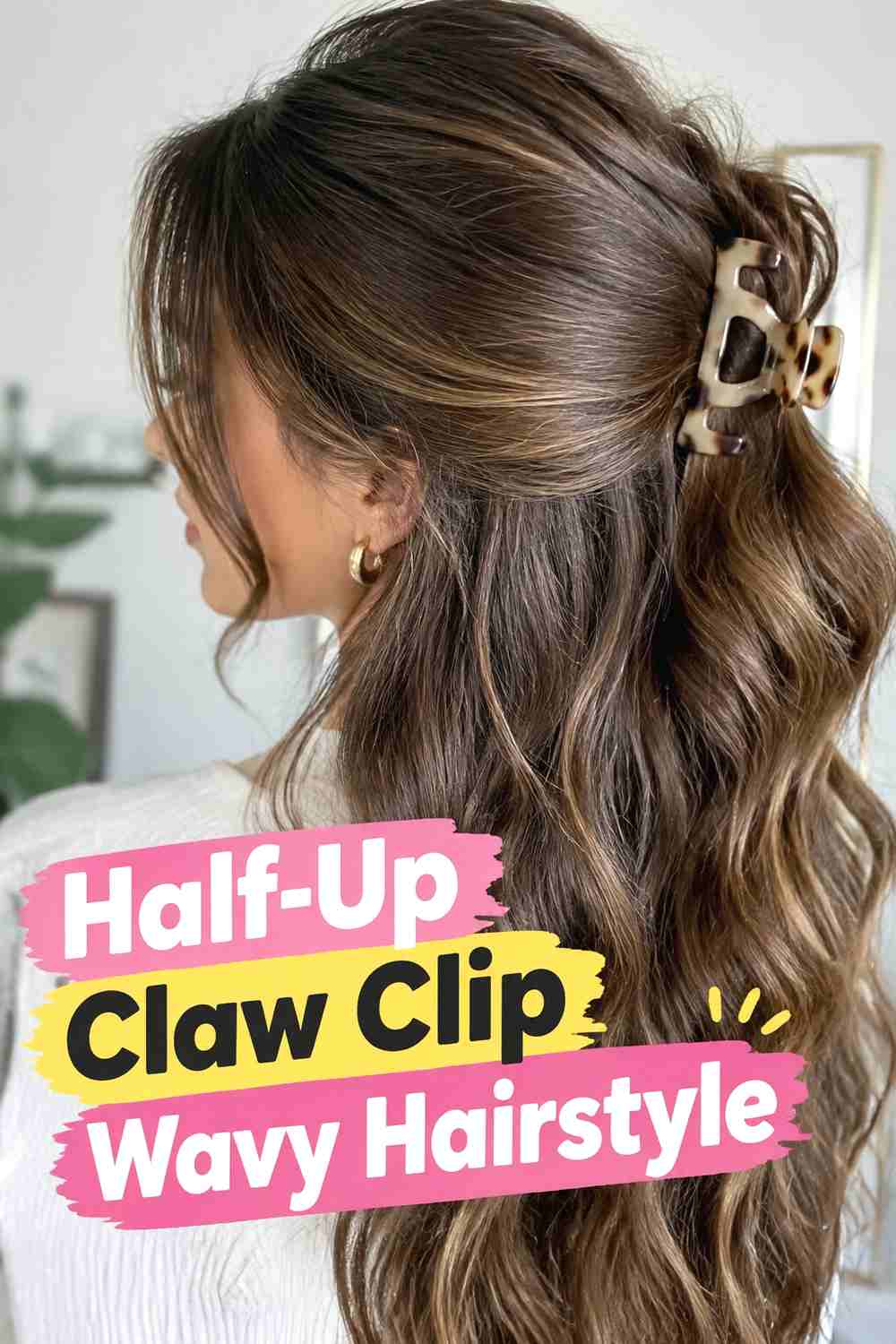 9. Half Up Claw Clip Wavy Hairstyle