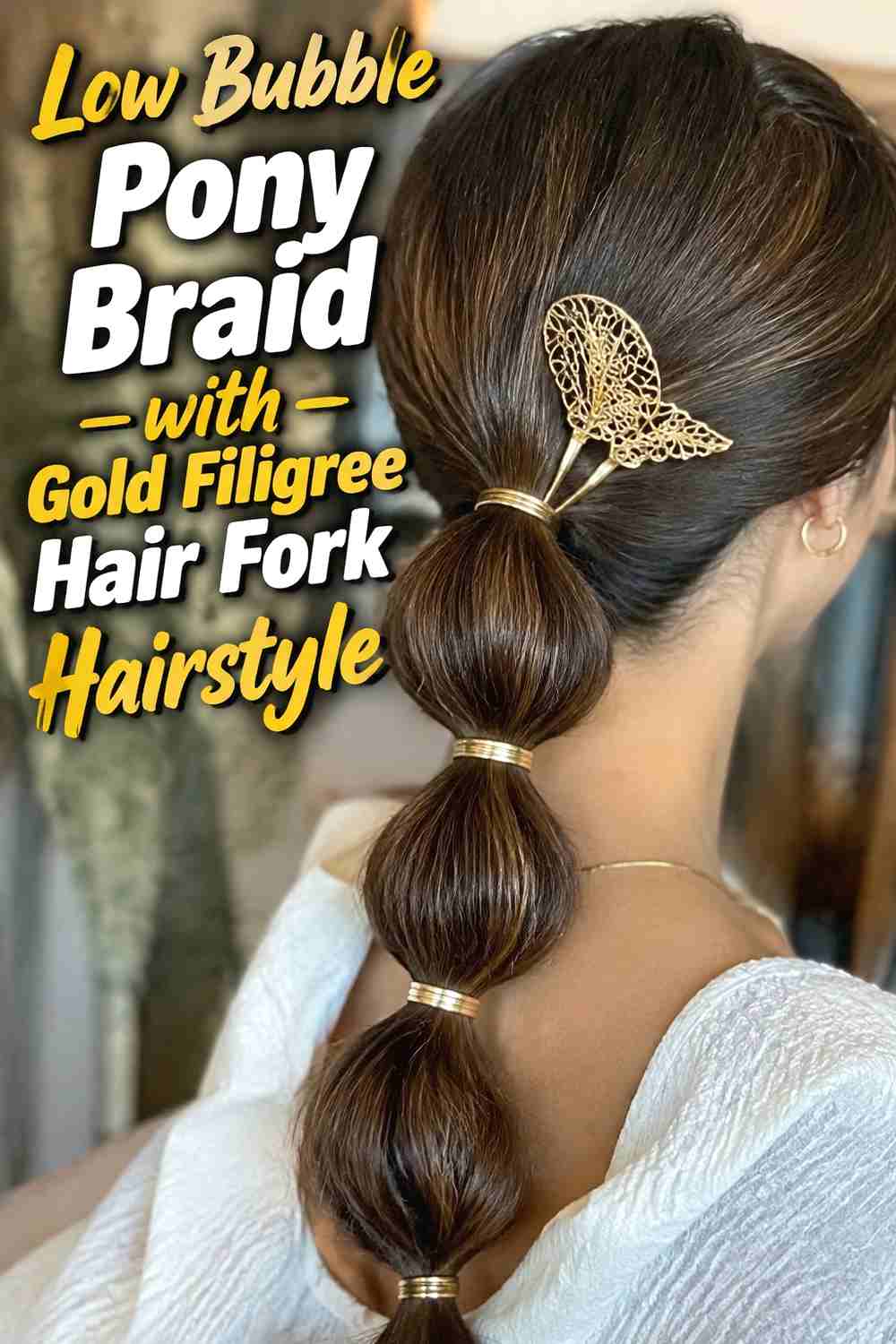 2. Low Bubble Pony Braid With Gold Filigree Hair Fork Hairstyle