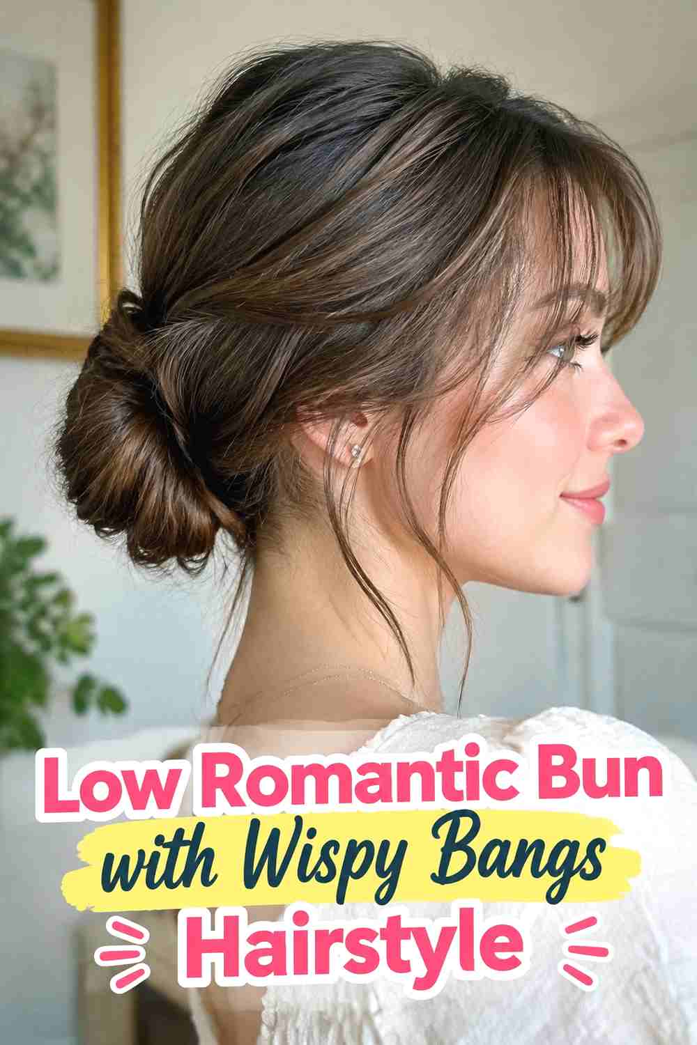 4. Low Romantic Bun With Wispy Bangs Hairstyle