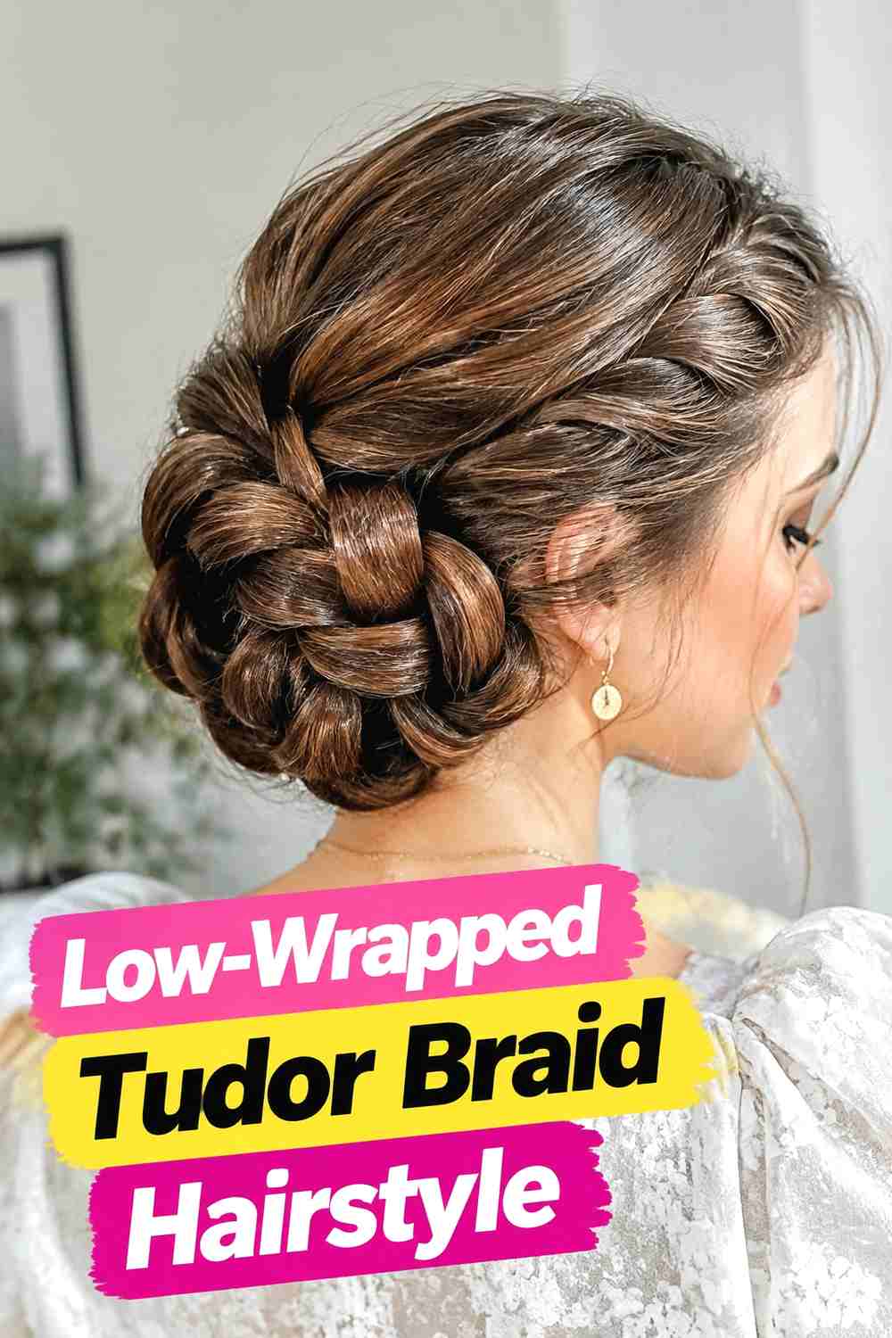 8. Low Wrapped Tudor Braid Hairstyle