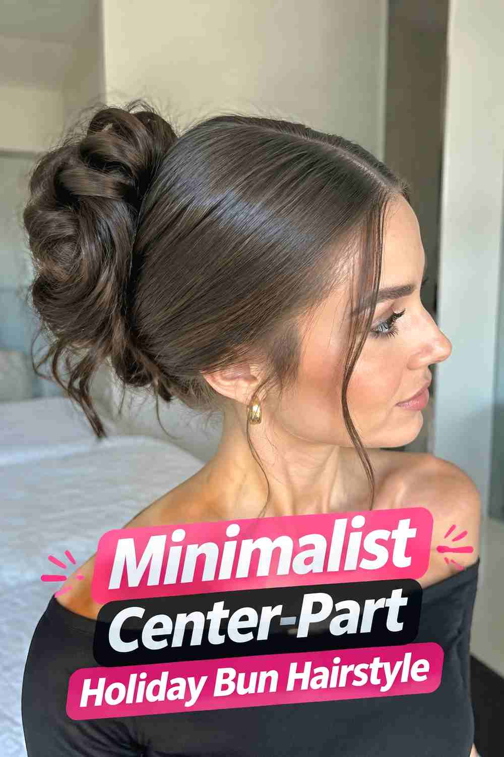 18. Minimalist Center Part Holiday Bun Hairstyle