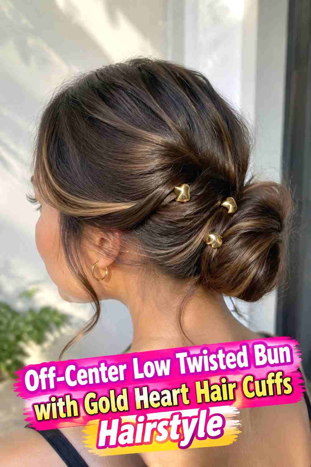 11. Off Center Low Twisted Bun With Gold Heart Hair Cuffs Hairstyle
