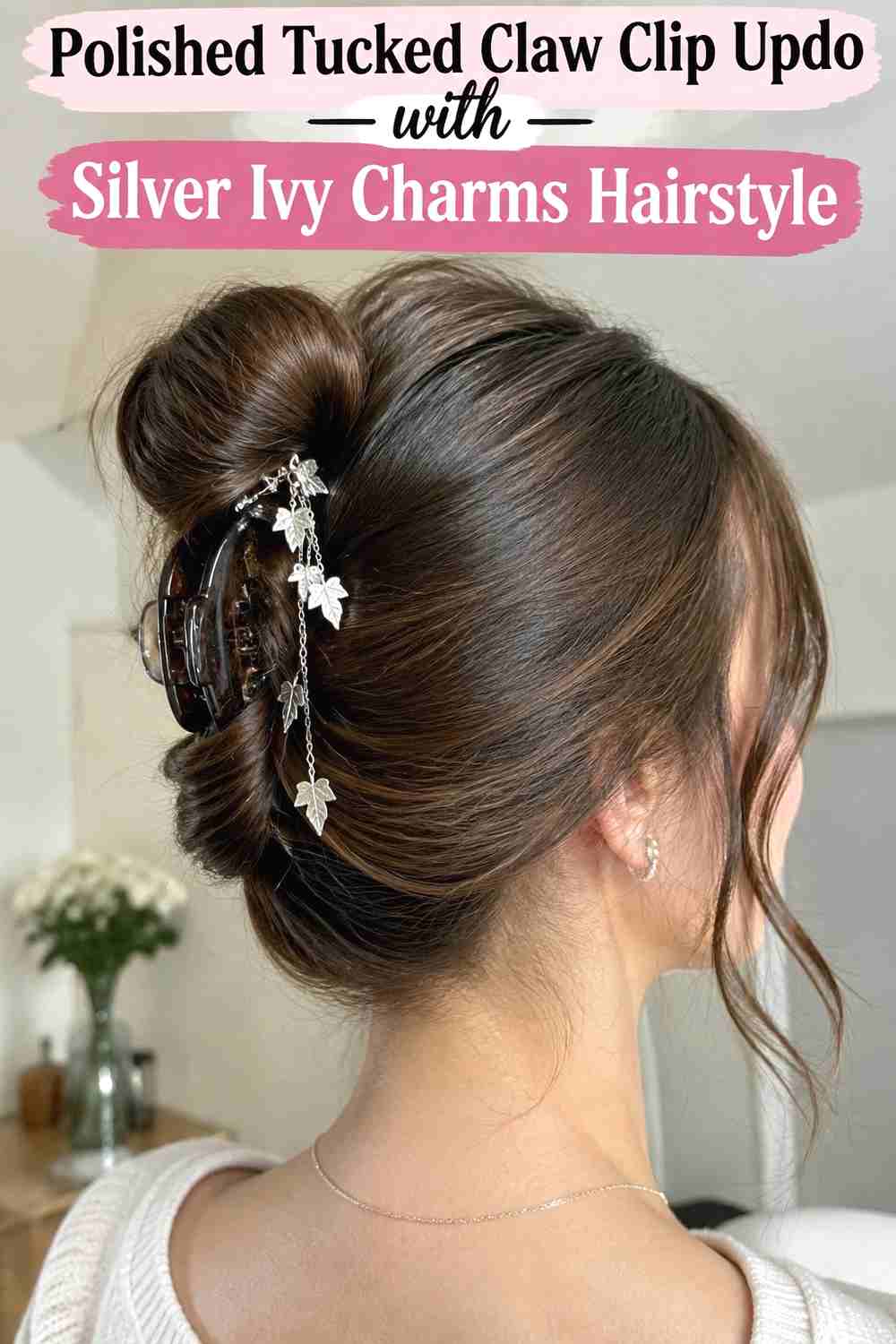 16. Polished Tucked Claw Clip Updo With Silver Ivy Charms Hairstyle