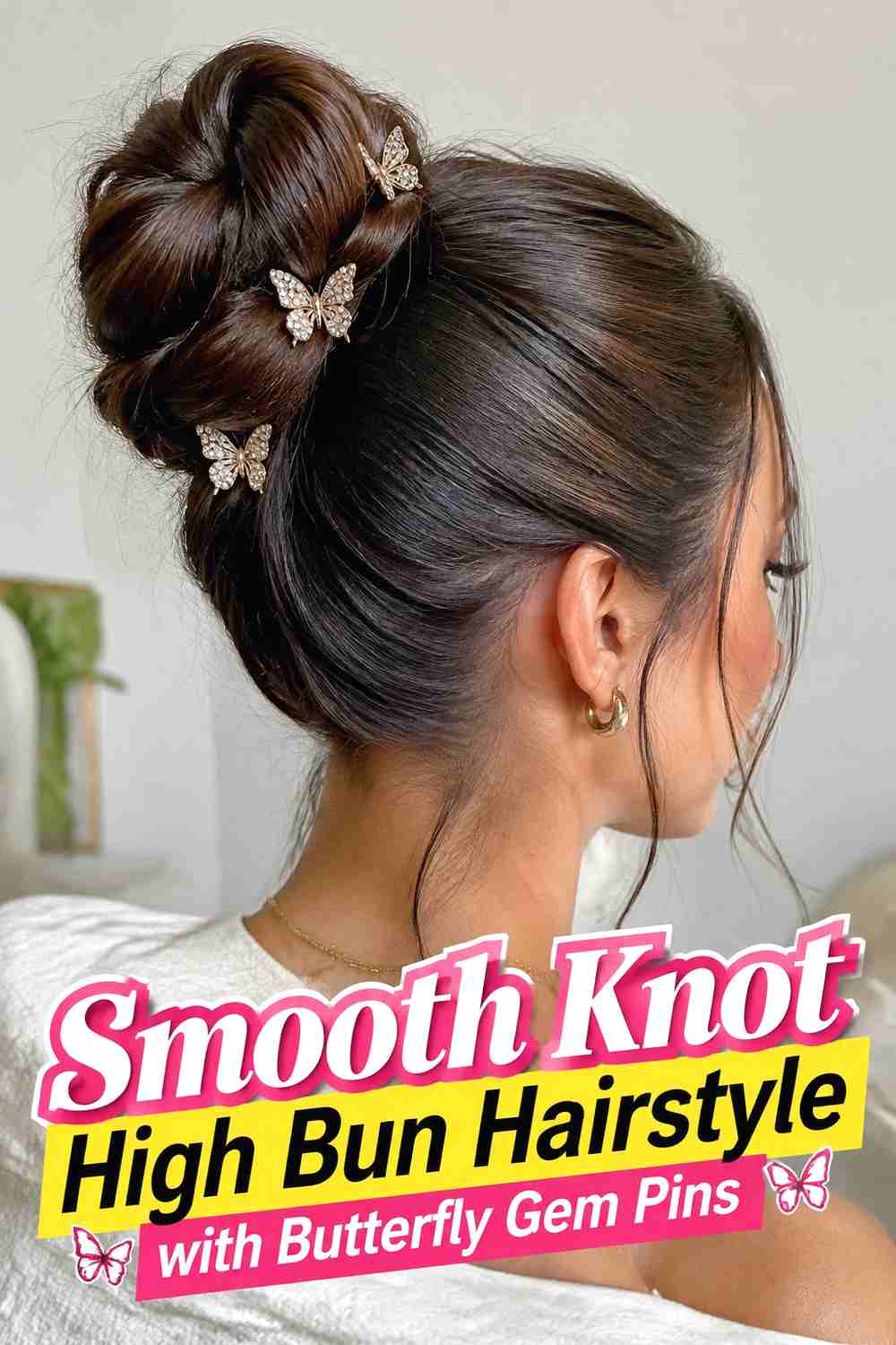 5. Smooth Knot High Bun Hairstyle With Butterfly Gem Pins
