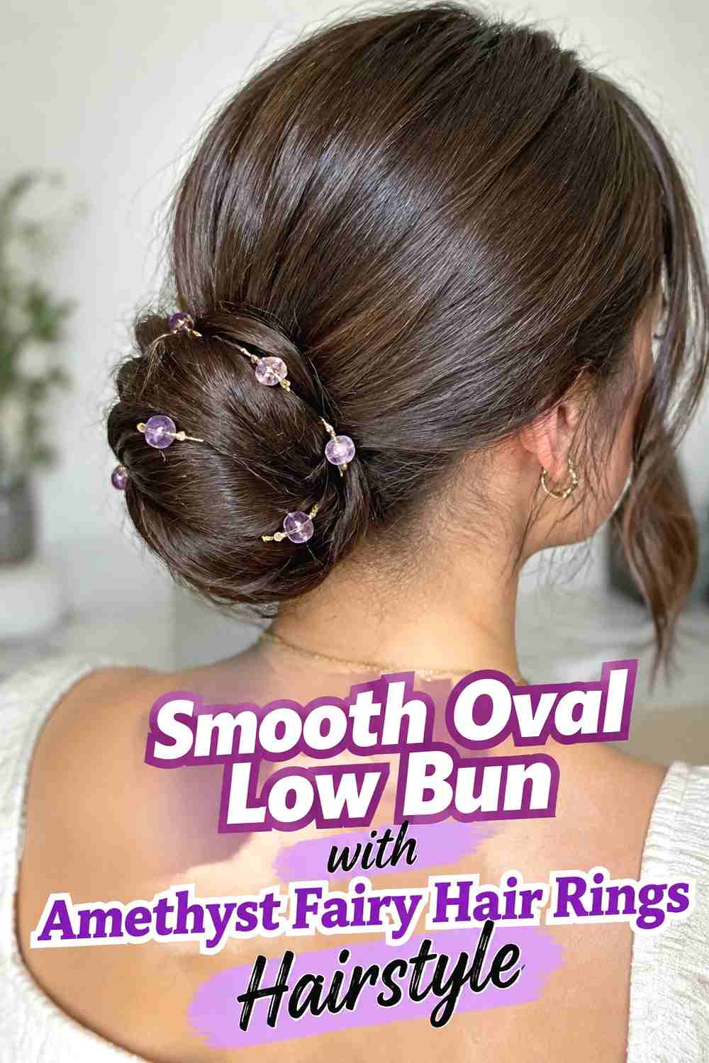 5. Smooth Oval Low Bun With Amethyst Fairy Hair Rings Hairstyle