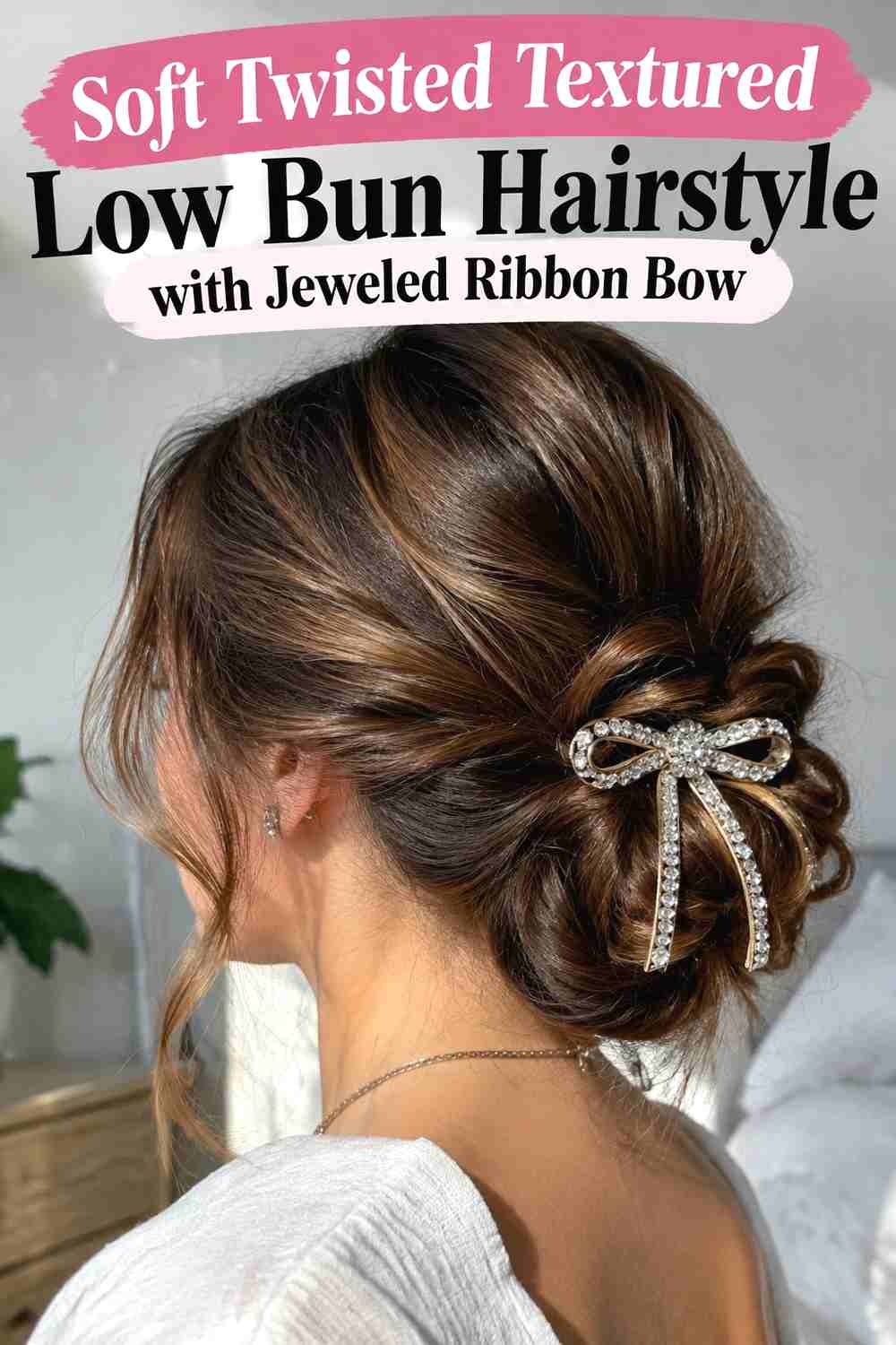 1. Soft Twisted Textured Low Bun Hairstyle With Jeweled Ribbon Bow