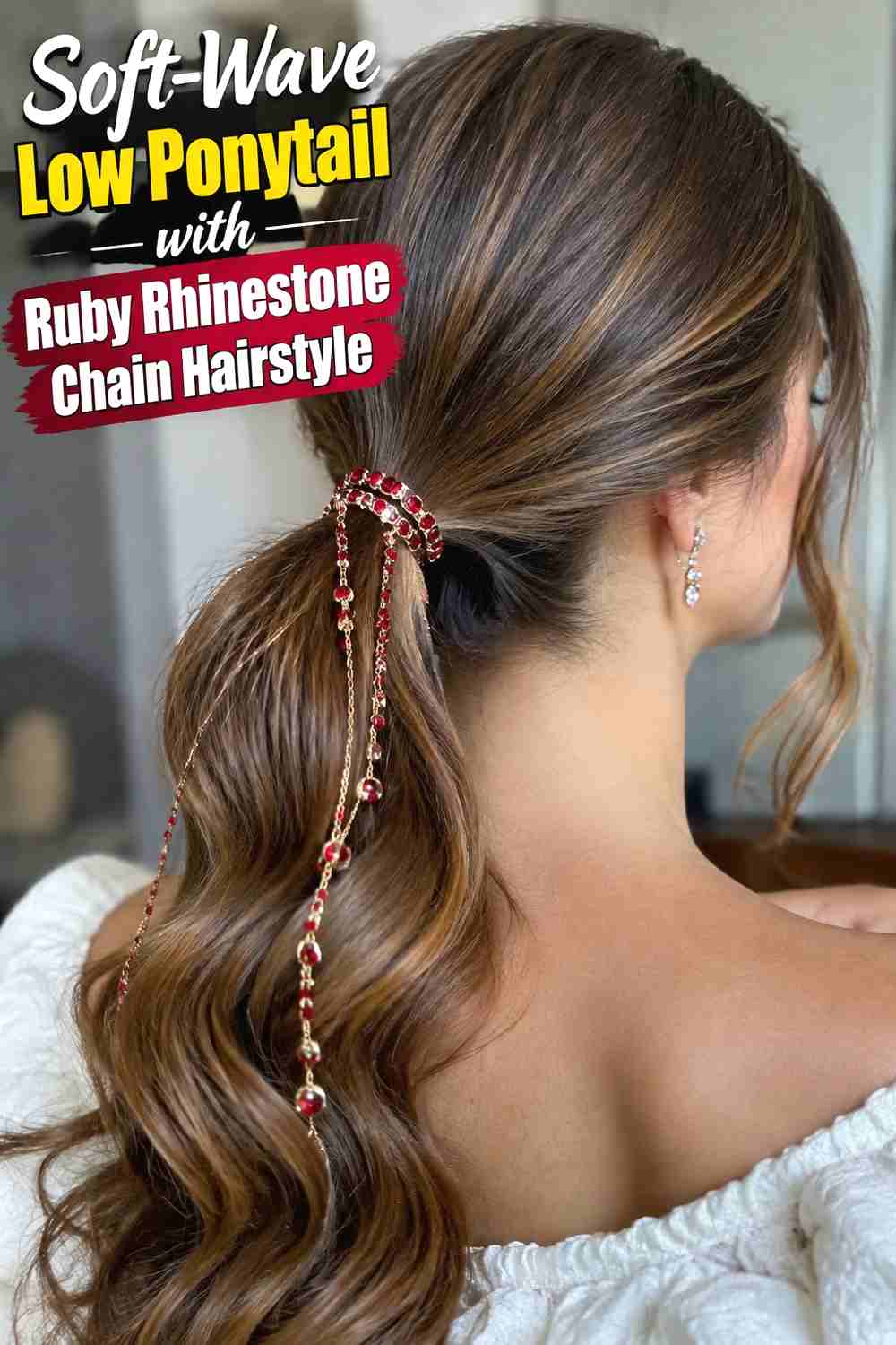 7. Soft Wave Low Ponytail With Ruby Rhinestone Chain Hairstyle