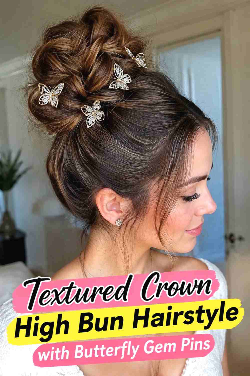 4. Textured Crown High Bun Hairstyle With Butterfly Gem Pins
