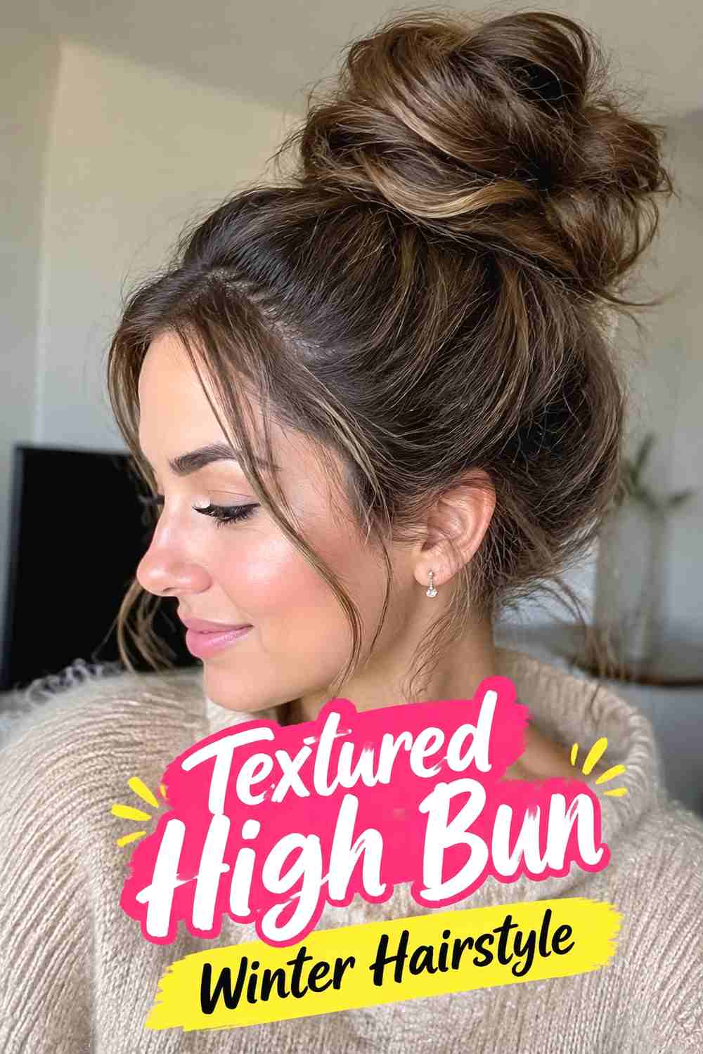 16. Textured High Bun Winter Hairstyle