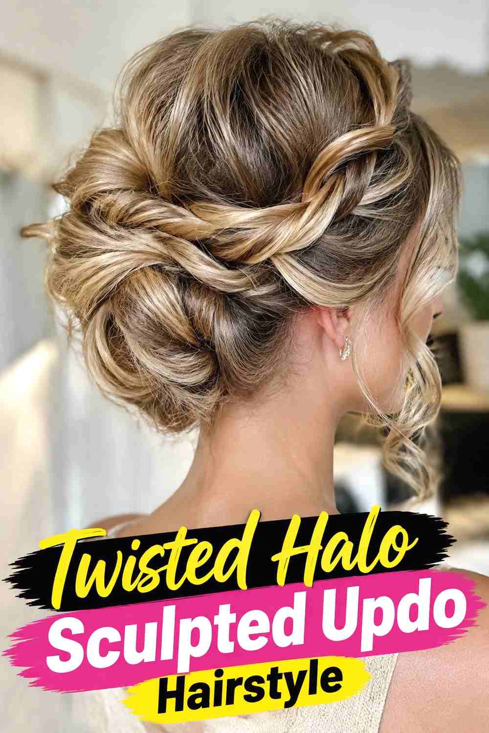 12. Twisted Halo Sculpted Updo Hairstyle