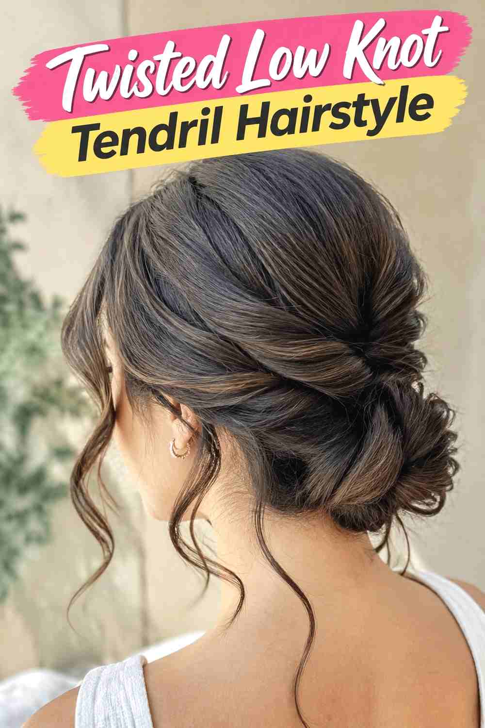 15. Twisted Low Knot Tendril Hairstyle