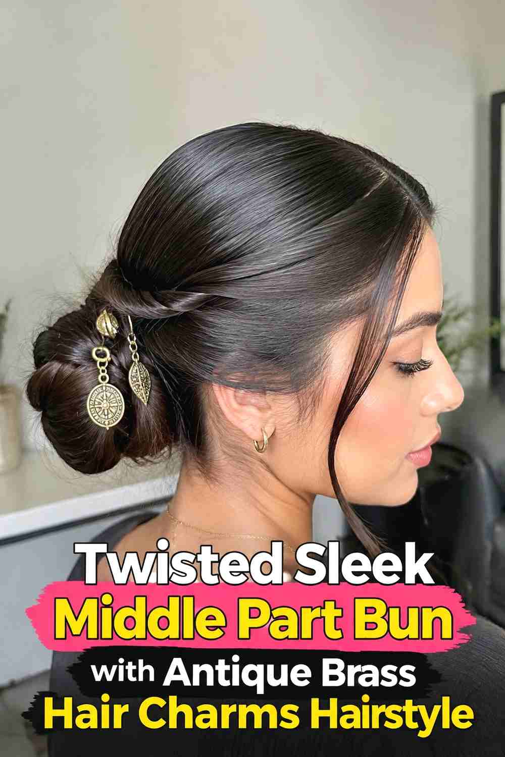 6. Twisted Sleek Middle Part Bun With Antique Brass Hair Charms Hairstyle