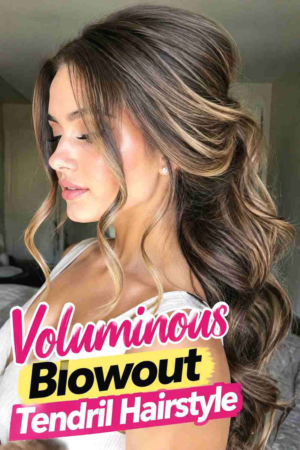 14. Voluminous Blowout Tendril Hairstyle