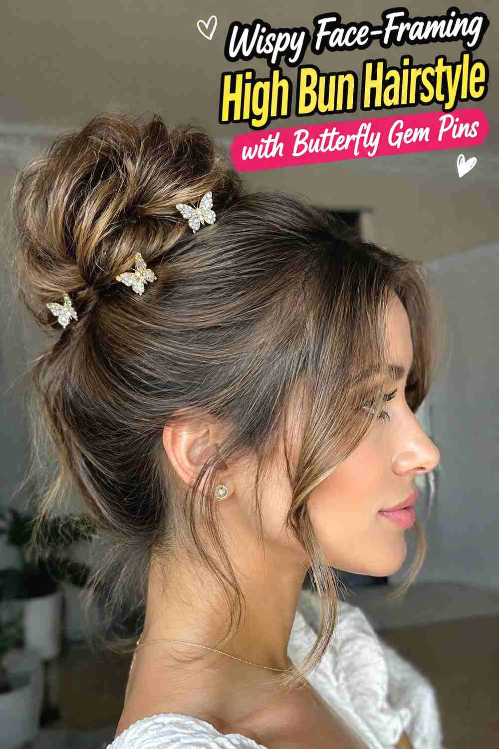 6. Wispy Face Framing High Bun Hairstyle With Butterfly Gem Pins
