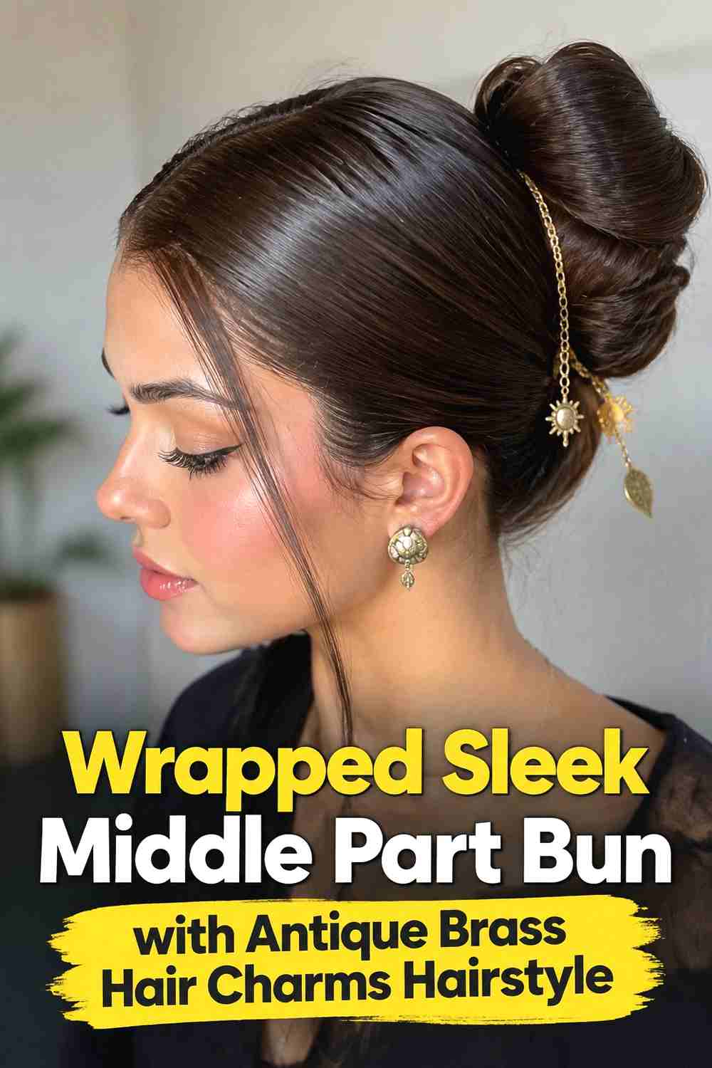 5. Wrapped Sleek Middle Part Bun With Antique Brass Hair Charms Hairstyle